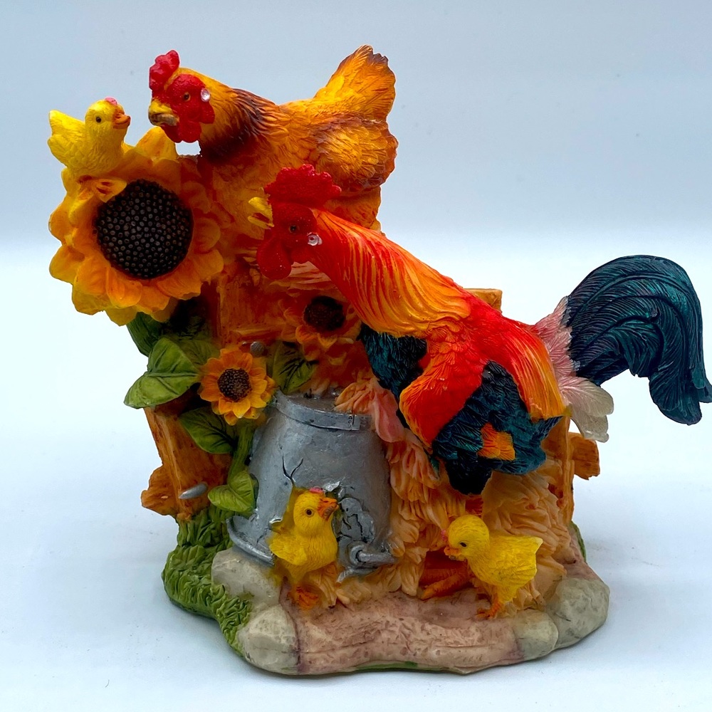 Rooster family statue